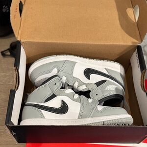 Nike Jordan 1 Mid .  Kids Gray and Black Sneakers